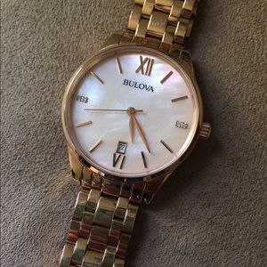 Bulova rose gold watch with diamond accents